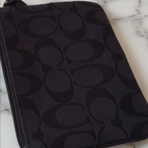 Small black coach wristlet, signature fabric